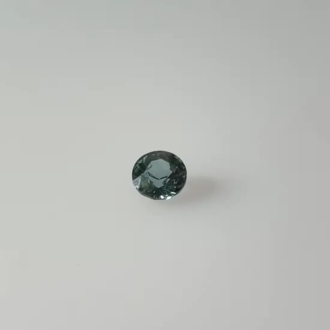 0.35ct Round Natural Sapphire (Colour Teal, Clarity Eye Clean, Cut Faceted)
