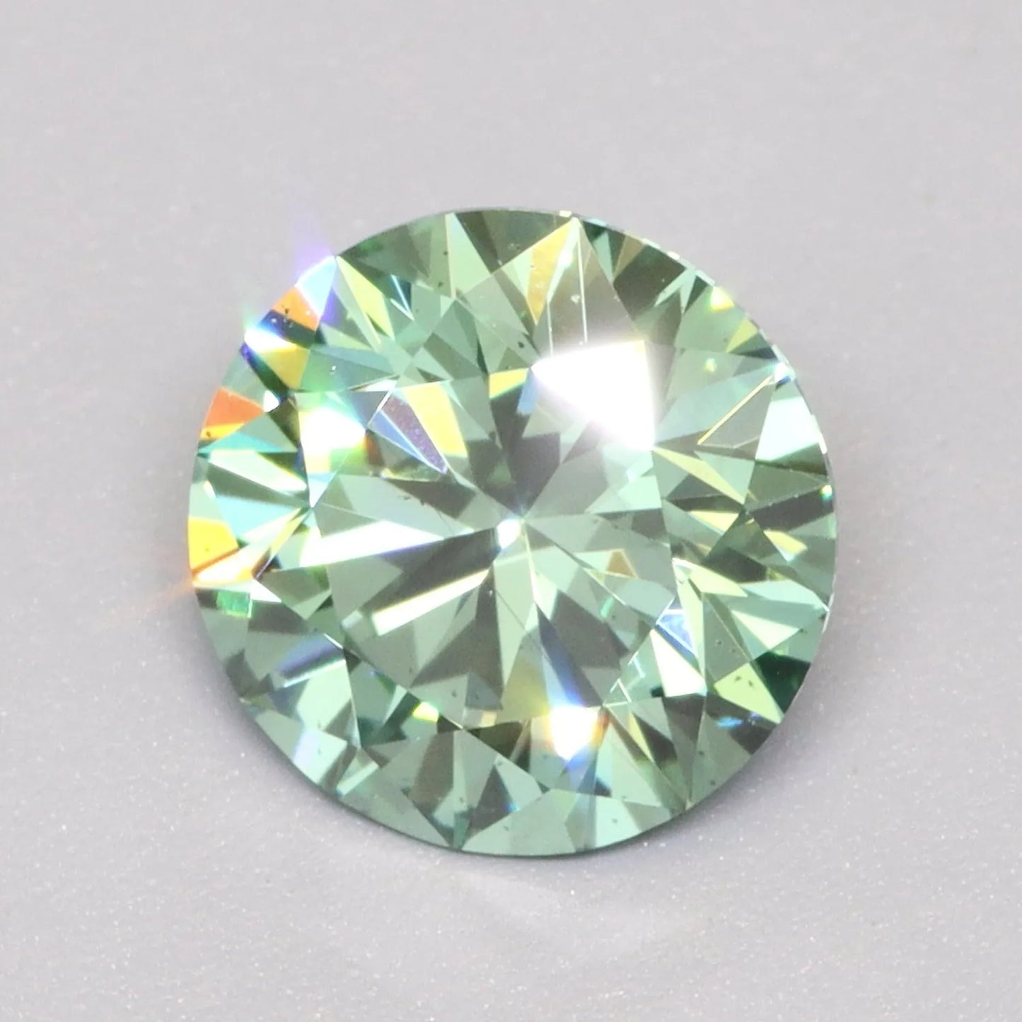 1.07ct Round Lab Grown Diamond (Colour Fancy Vivid Green, Clarity VS2, Cut ID, IGI Certified)
