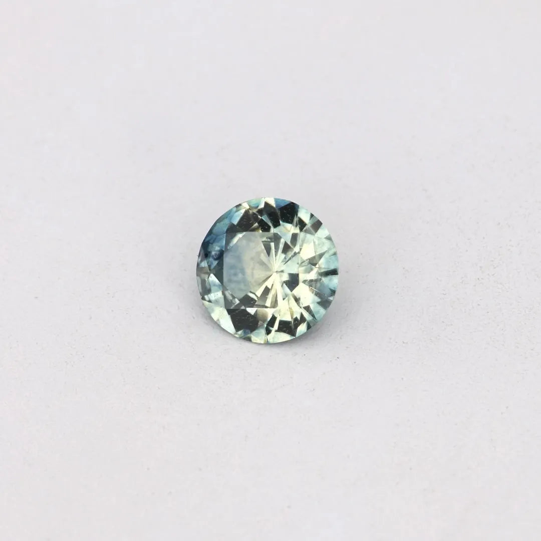 0.26ct Round Natural Sapphire (Colour Multicolor, Clarity Eye Clean, Cut Faceted)
