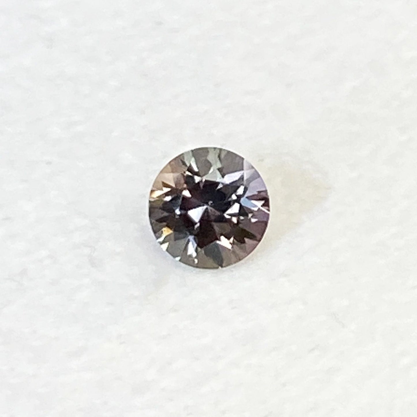 0.39ct Round Natural Sapphire (Colour Multicolor, Clarity Eye Clean, Cut Faceted)