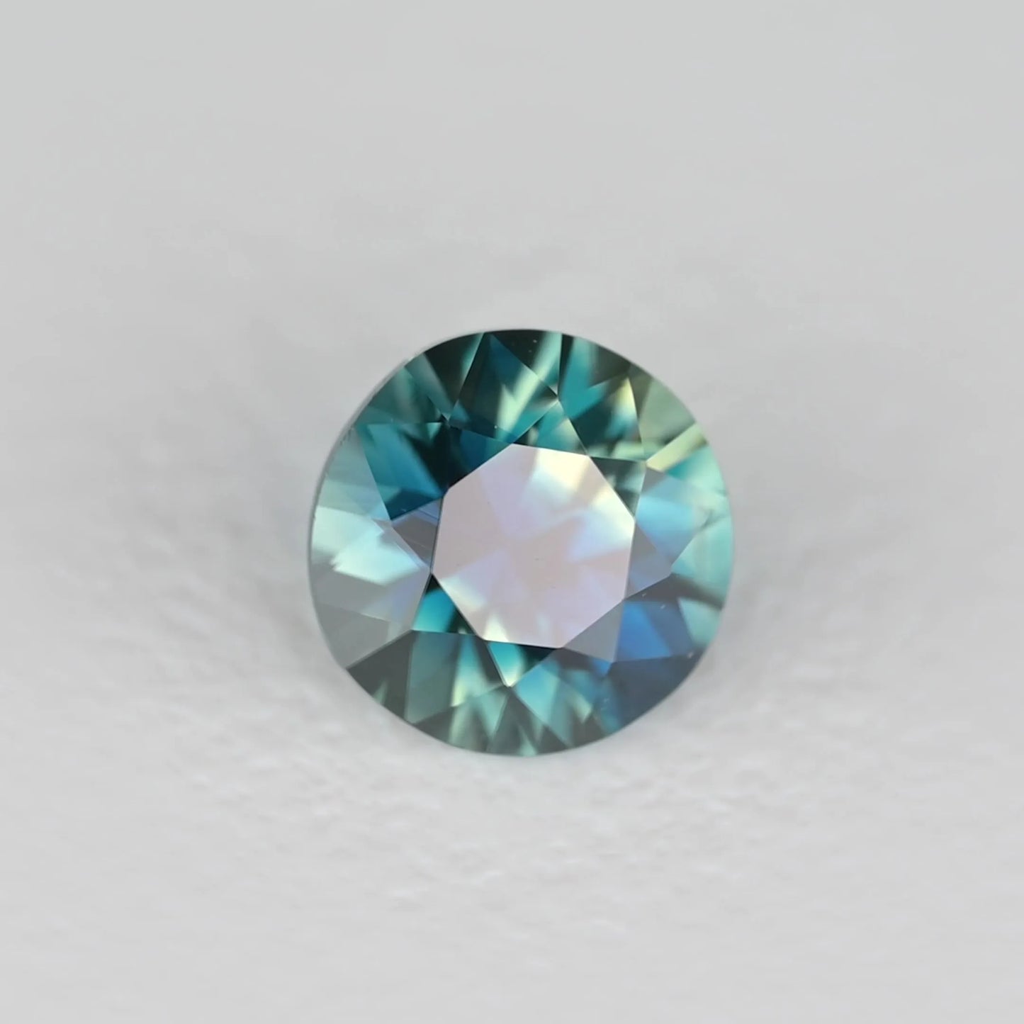 0.48ct Round Natural Sapphire (Colour Teal, Clarity Eye Clean, Cut Faceted)