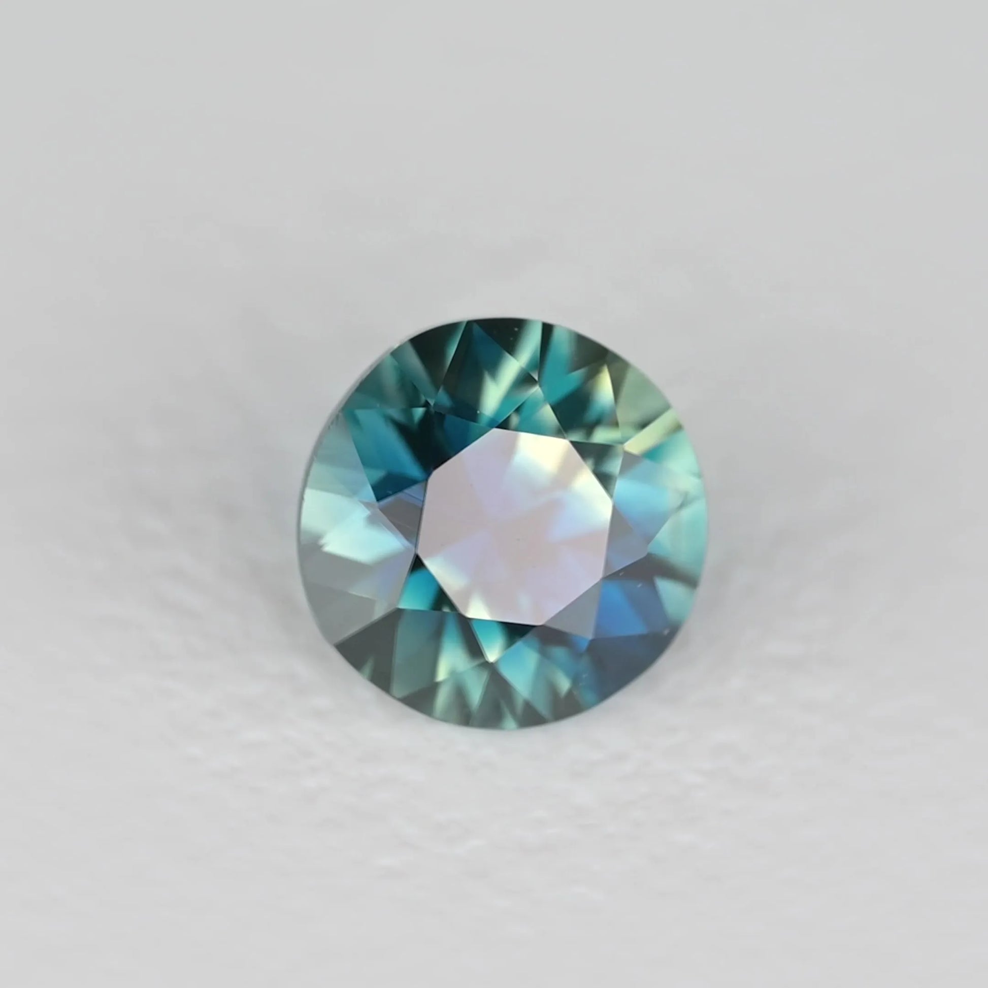 0.48ct Round Natural Sapphire (Colour Teal, Clarity Eye Clean, Cut Faceted)