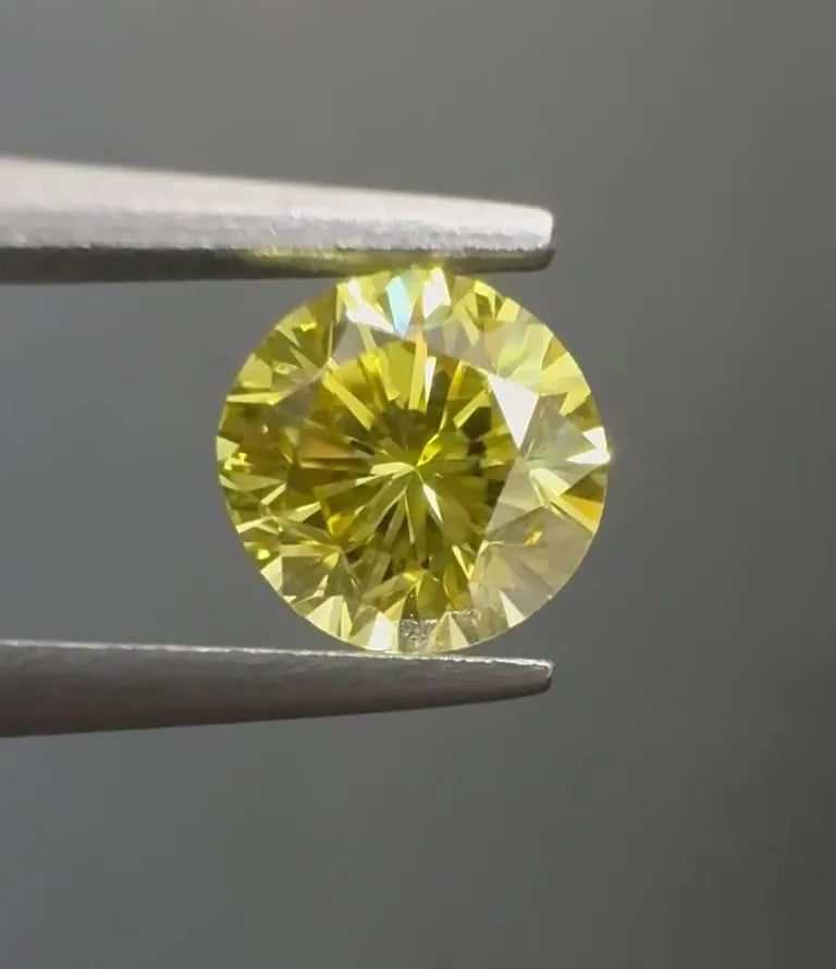 0.58ct Round Natural Diamond (Colour Fancy Intense Yellow, Clarity SI2, Cut GD, GIA Certified)