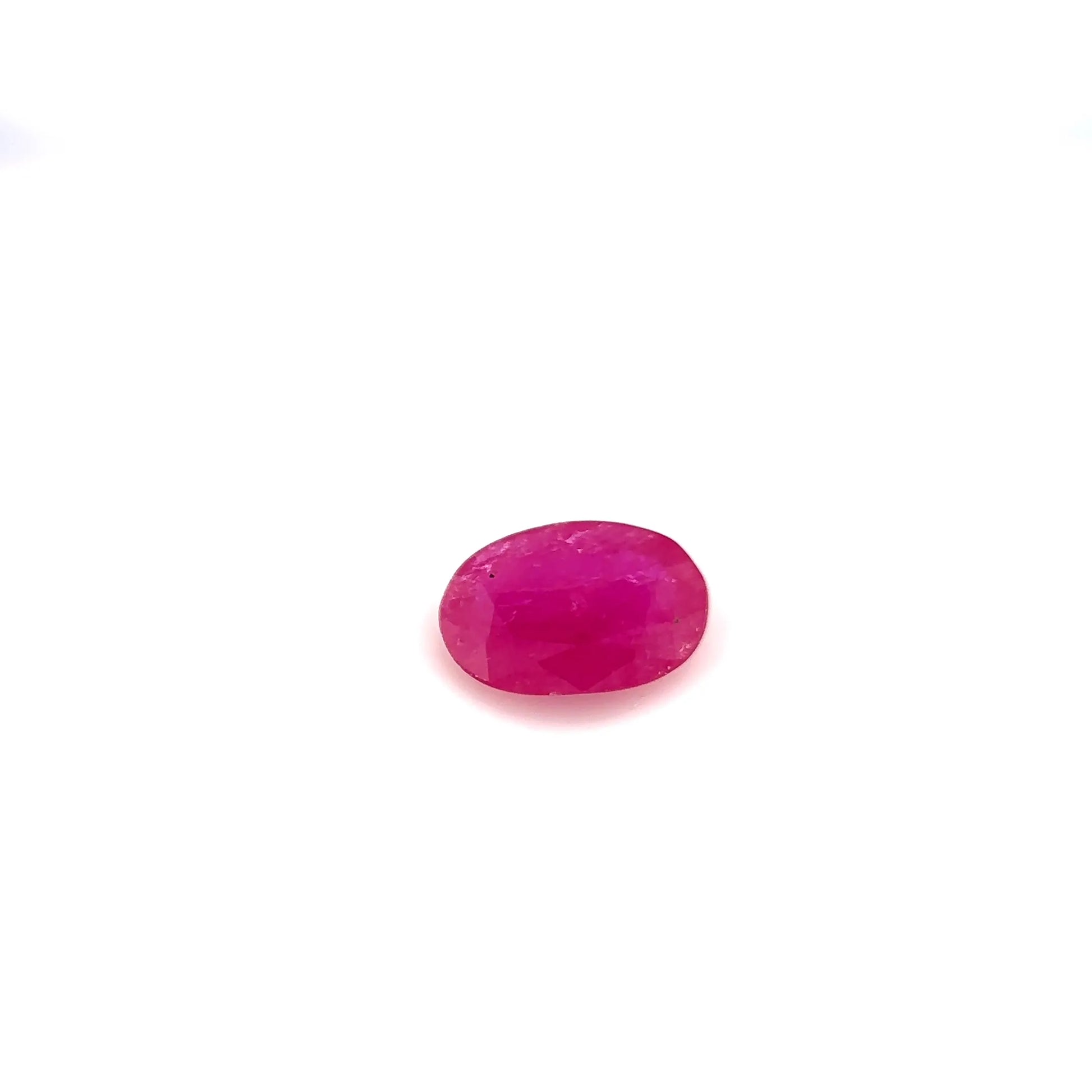 0.77ct Oval Natural Ruby (Colour Red, Clarity Slightly Included, Cut Faceted)