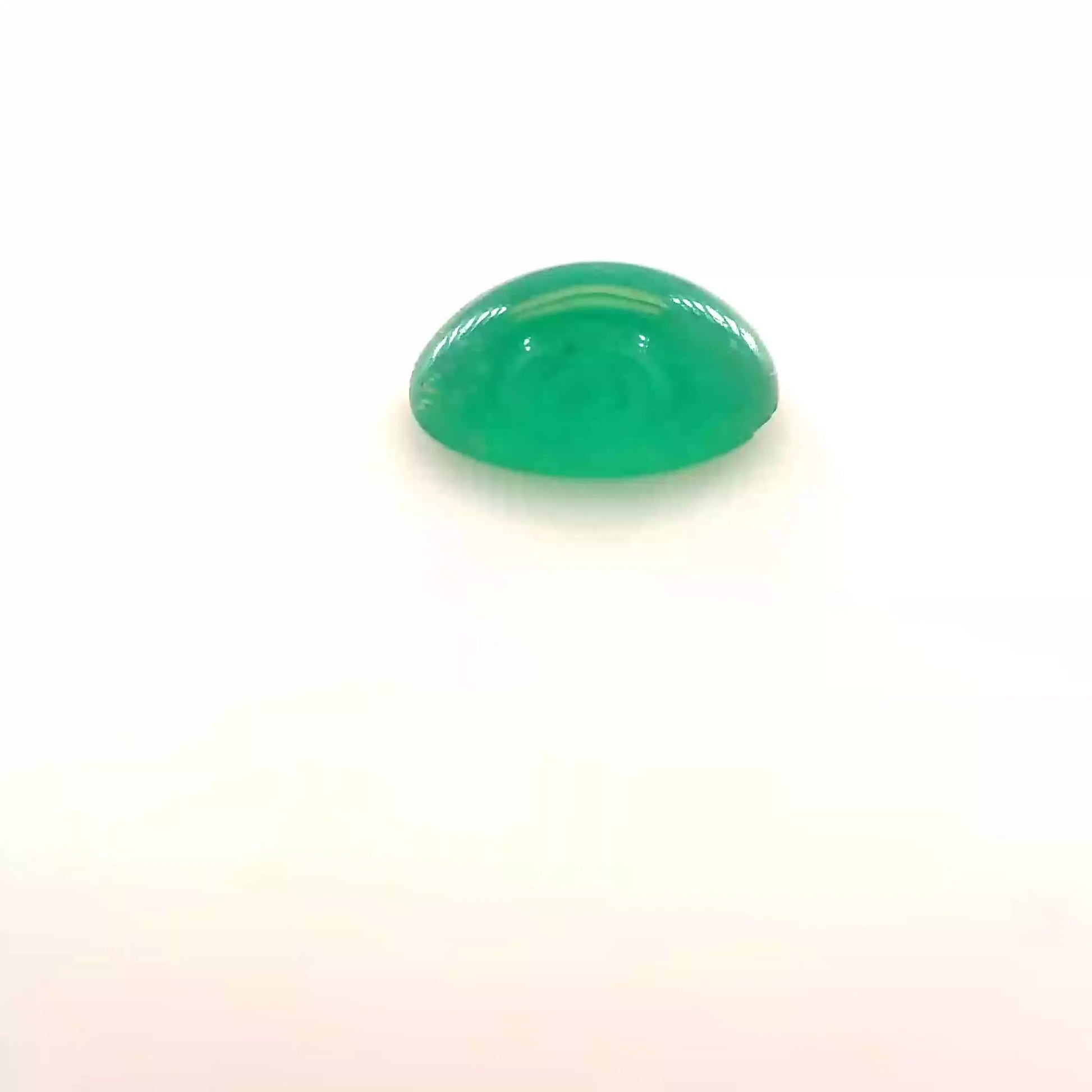 0.78ct Oval Natural Emerald (Colour Green, Clarity Moderately Included, Cut Cabochon)