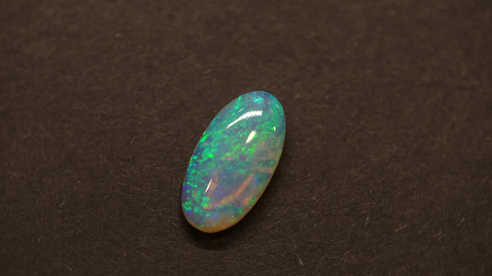 3.60ct Oval Natural Opal (Colour Multicolor, Clarity Moderately Included, Cut Cabochon)