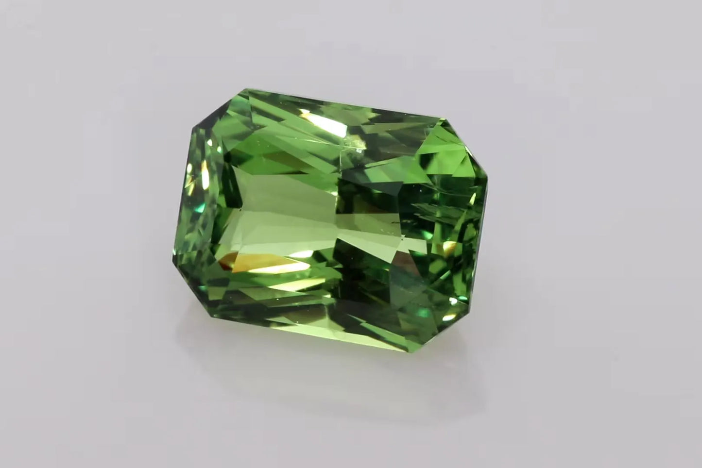 9.72ct Emerald Natural Sapphire (Colour Green, Clarity Slightly Included, Cut Faceted)