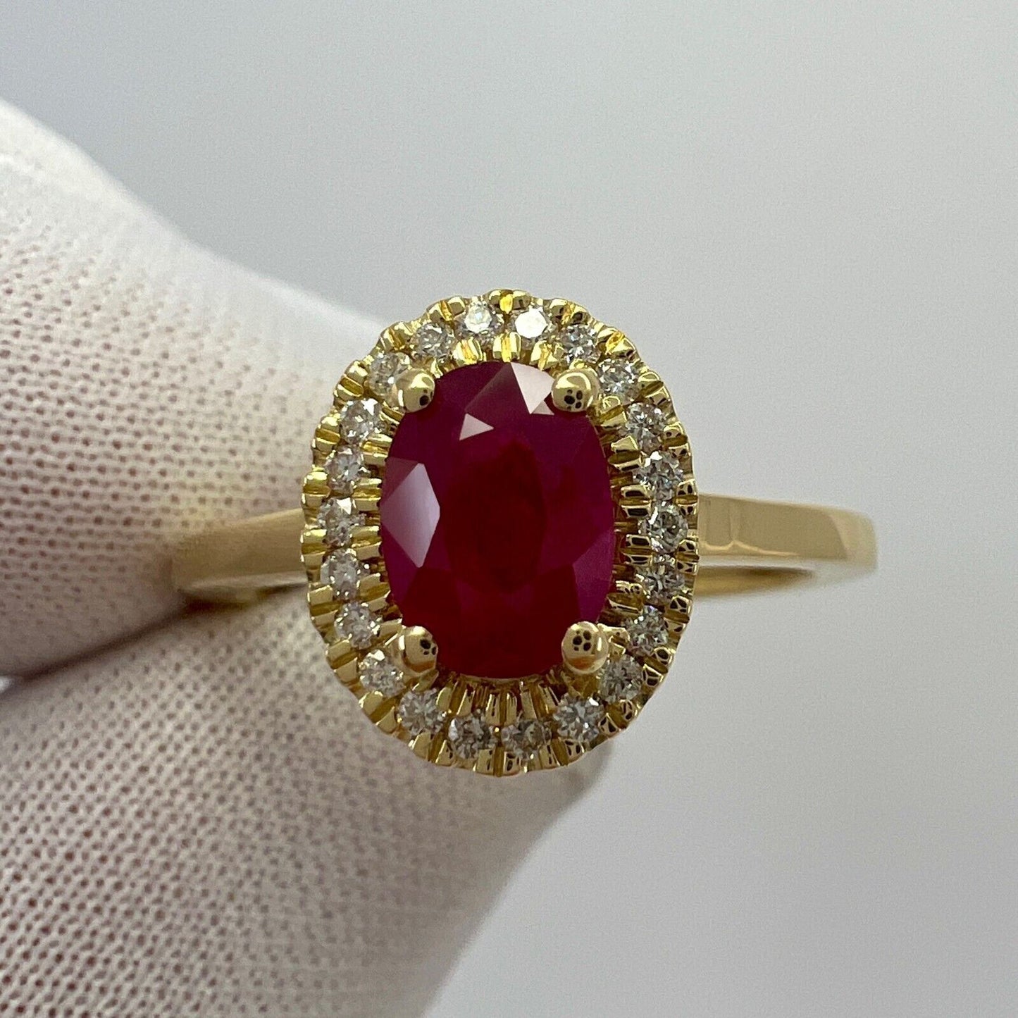 1.06 Carat Deep Red Ruby And Diamond Oval Cut 18k Yellow Gold Halo Cluster Ring