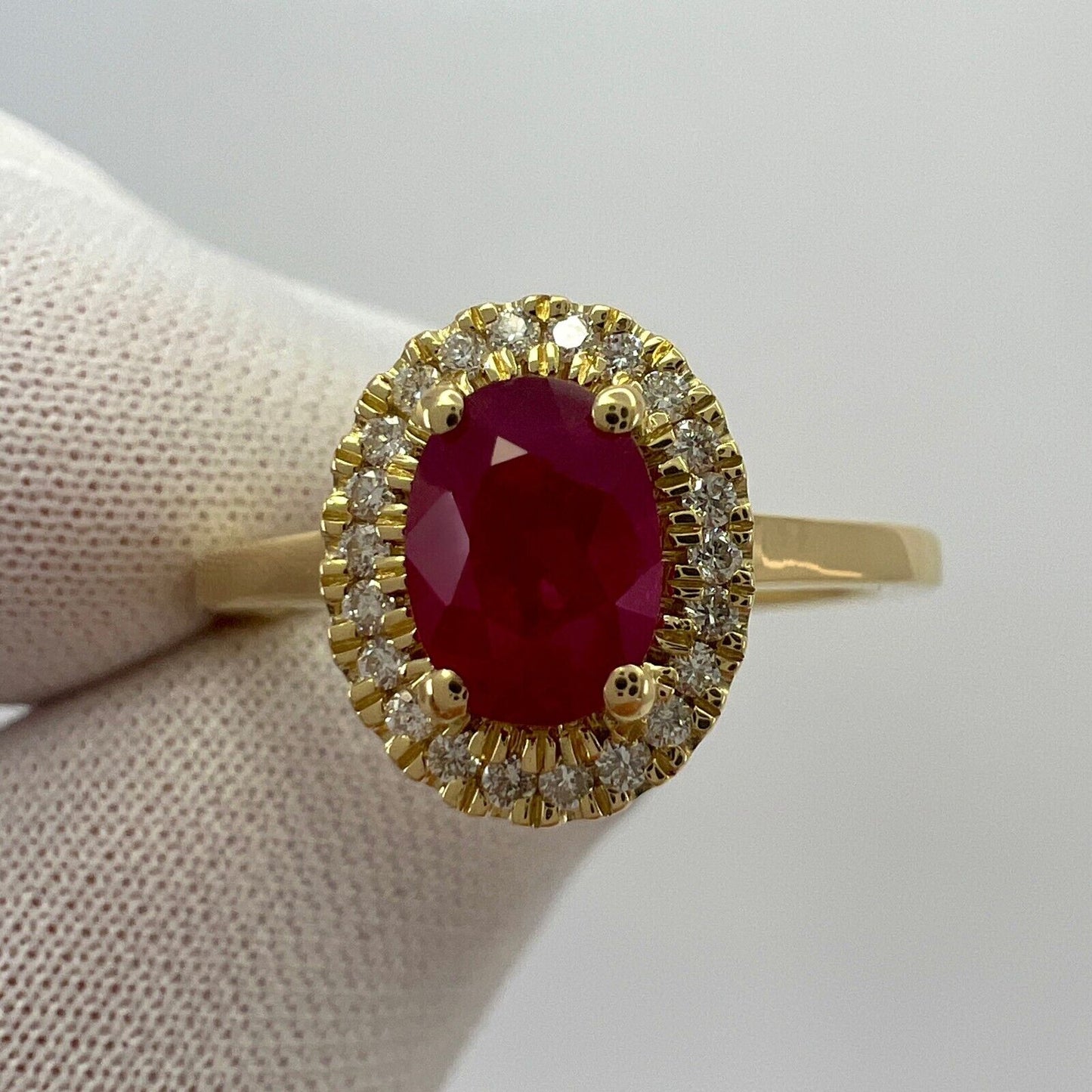 1.06 Carat Deep Red Ruby And Diamond Oval Cut 18k Yellow Gold Halo Cluster Ring