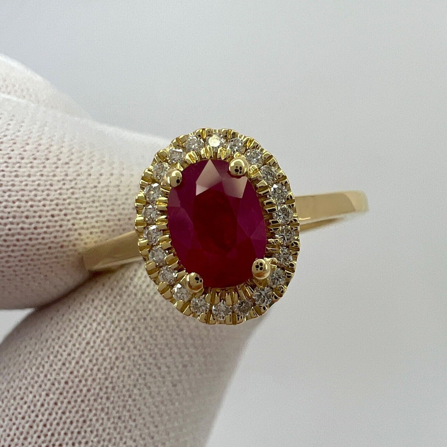 1.06 Carat Deep Red Ruby And Diamond Oval Cut 18k Yellow Gold Halo Cluster Ring