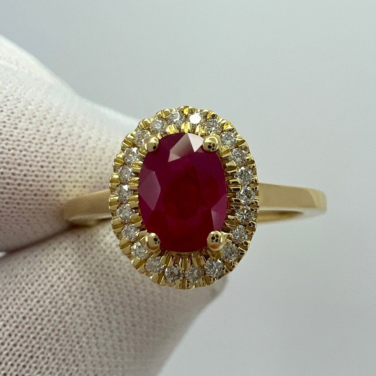 1.06 Carat Deep Red Ruby And Diamond Oval Cut 18k Yellow Gold Halo Cluster Ring