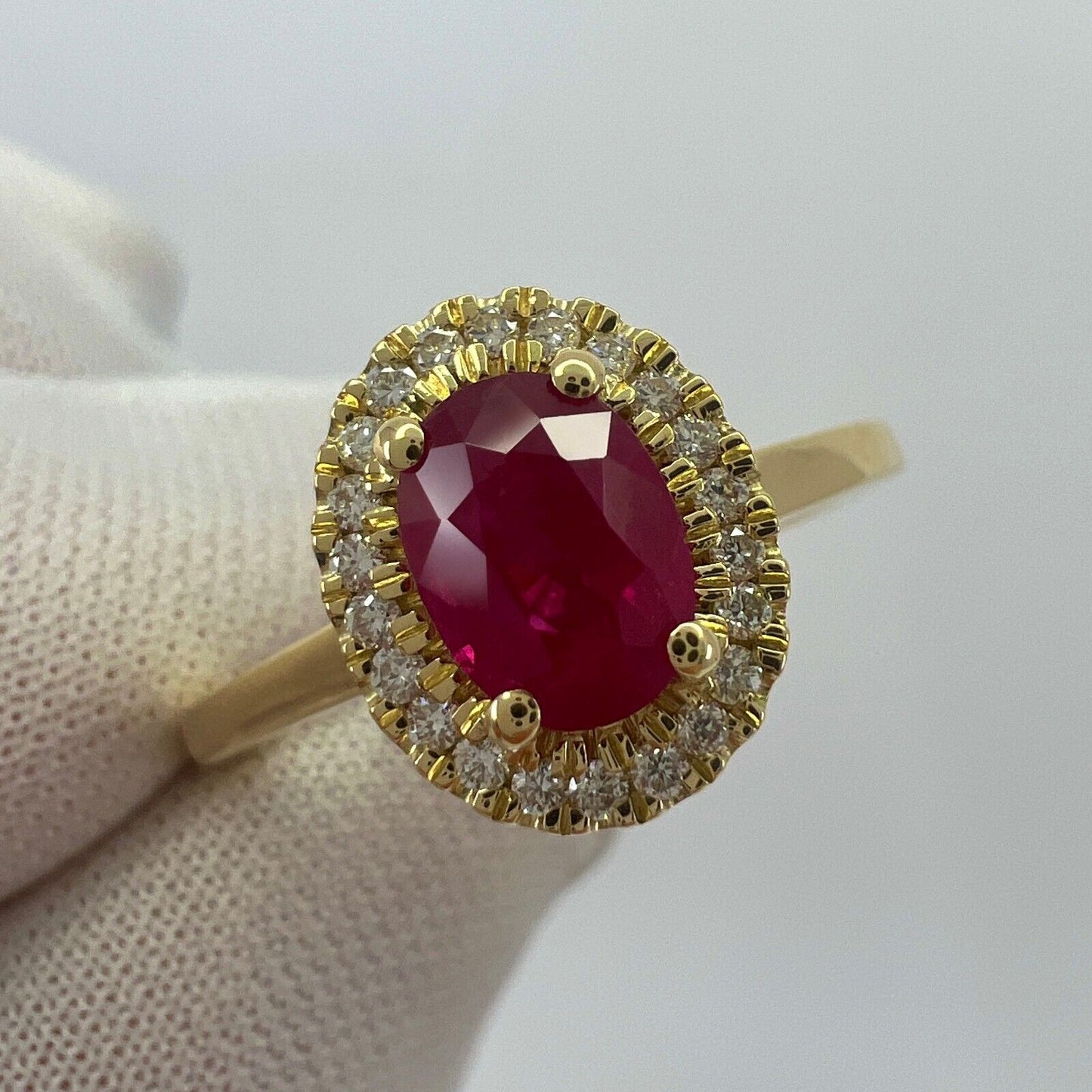 1.06 Carat Deep Red Ruby And Diamond Oval Cut 18k Yellow Gold Halo Cluster Ring