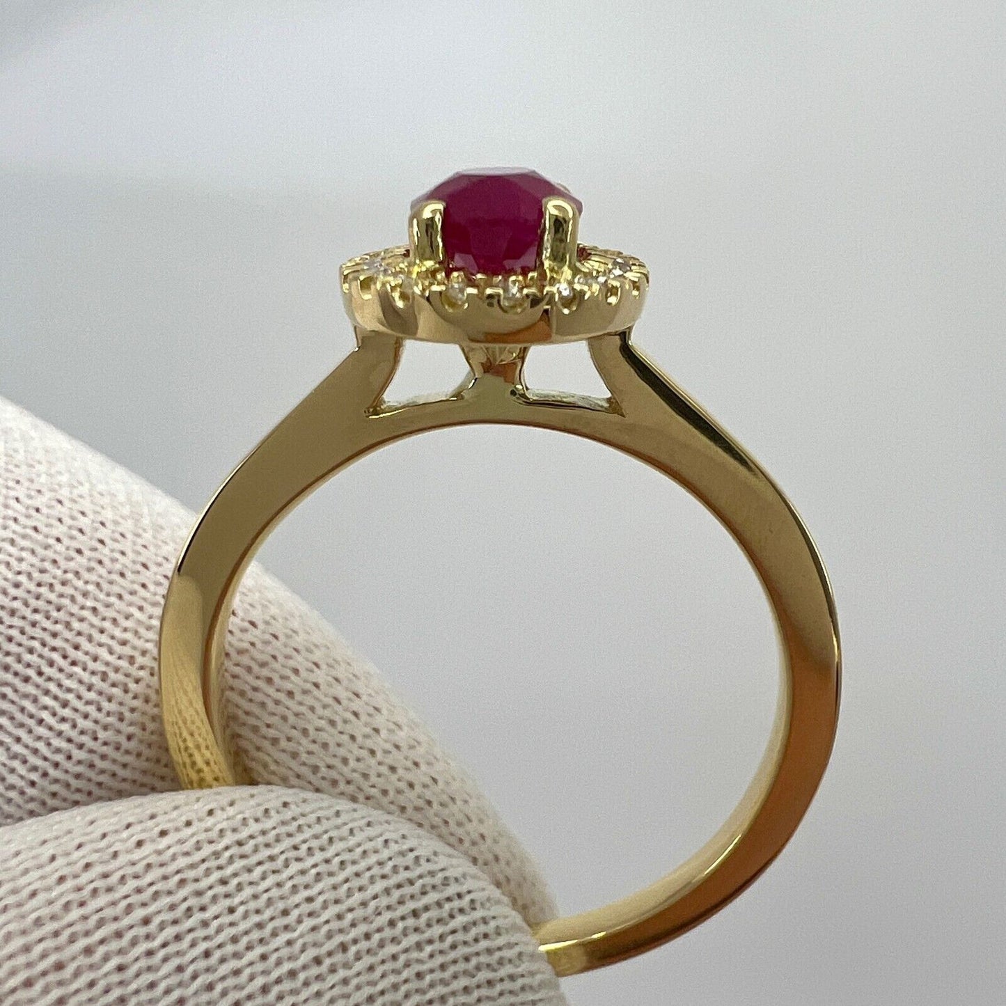 1.06 Carat Deep Red Ruby And Diamond Oval Cut 18k Yellow Gold Halo Cluster Ring