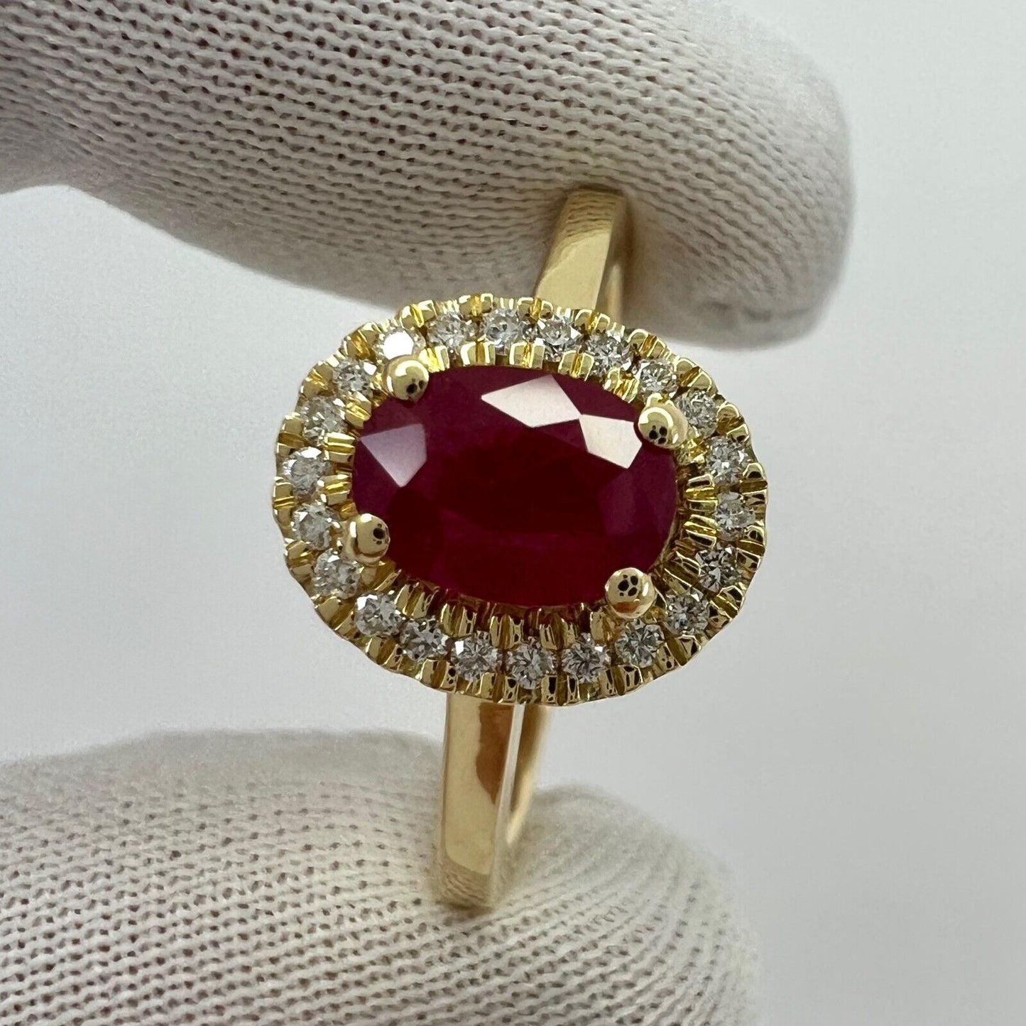 1.06 Carat Deep Red Ruby And Diamond Oval Cut 18k Yellow Gold Halo Cluster Ring