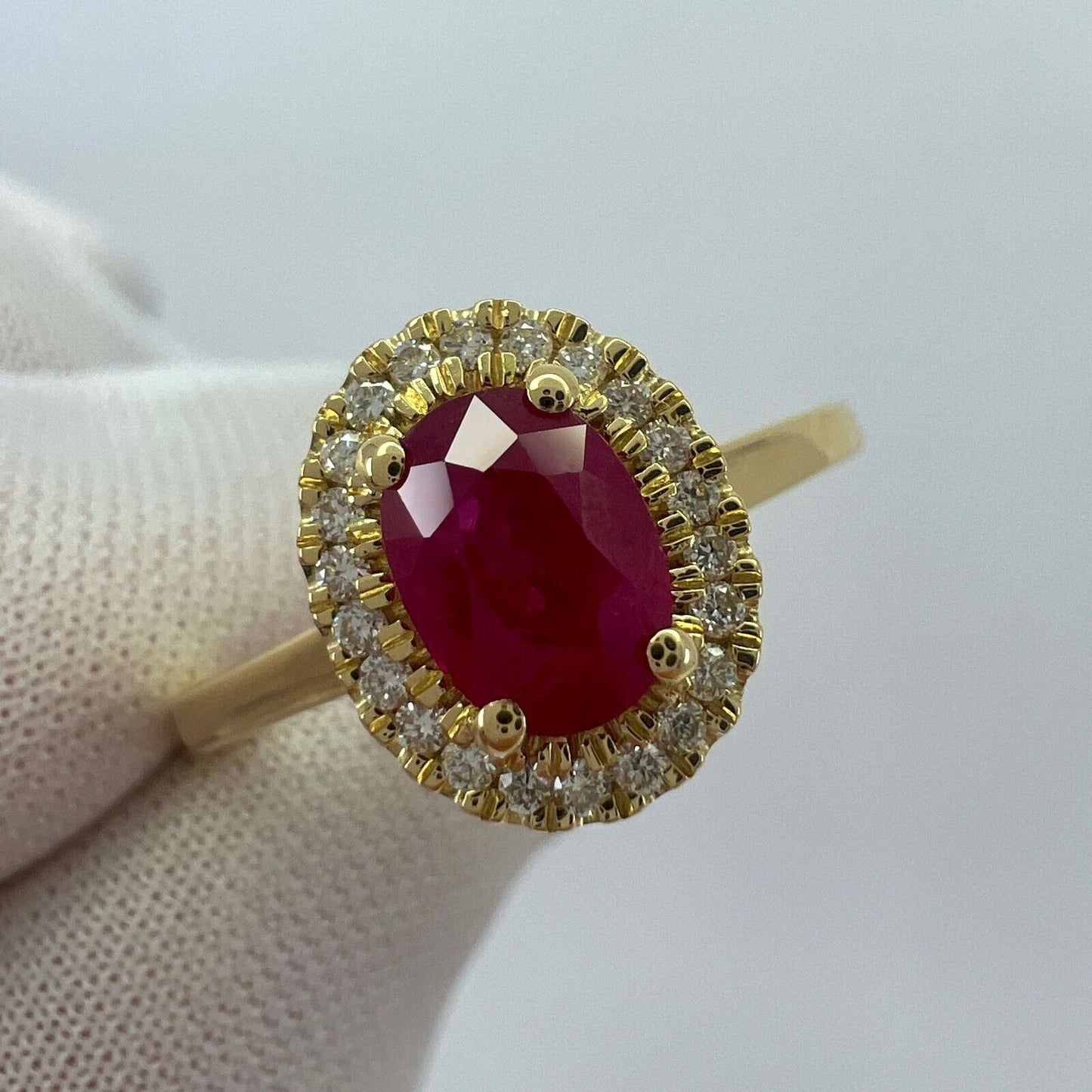 1.06 Carat Deep Red Ruby And Diamond Oval Cut 18k Yellow Gold Halo Cluster Ring